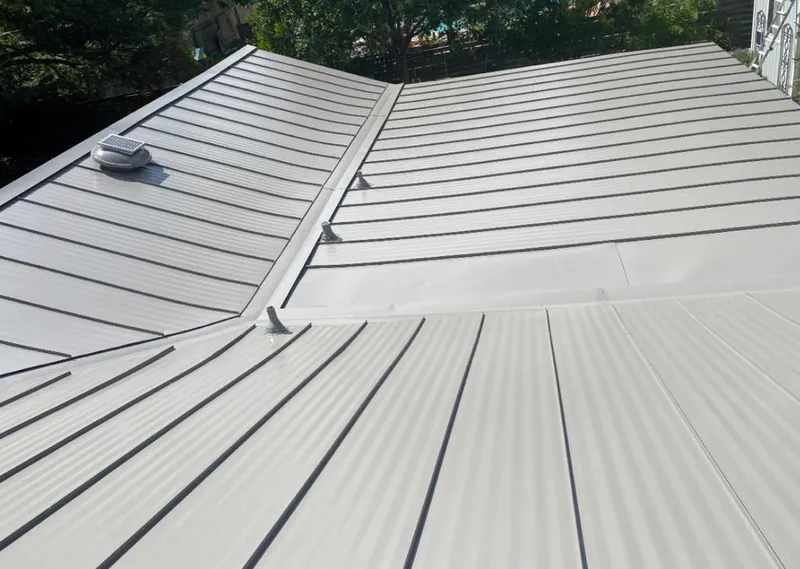 Solar attic fan installed on a metal roof for Roof Ventilation in El Dorado Hills